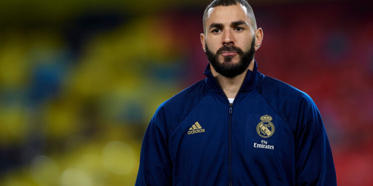 Benzema em ação com a camisa do Real Madrid (Crédito: GettyImages)