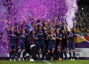 Lyon comemorando o título da Women's Champions League (Crédito: GettyImages)