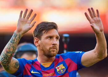 Messi em ação com a camisa do Barcelona (Crédito: GettyImages)