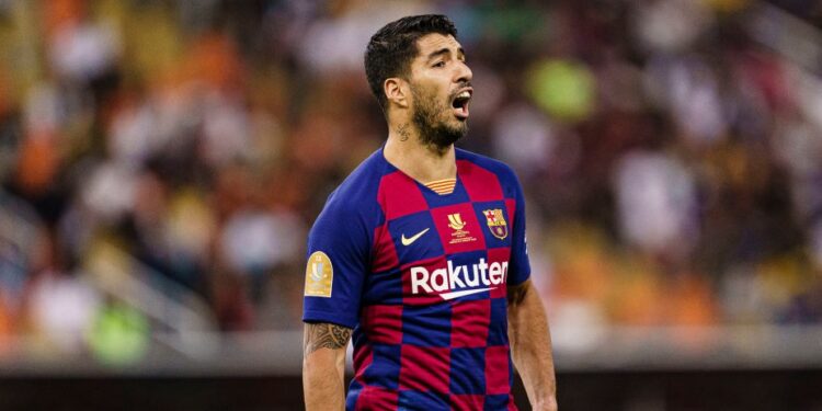Suárez em ação com a camisa do Barcelona (Crédito: GettyImages)