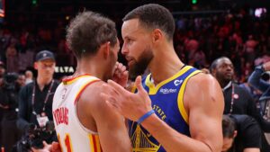 Stephen Curry e Trae Young (Crédito: Getty Images)