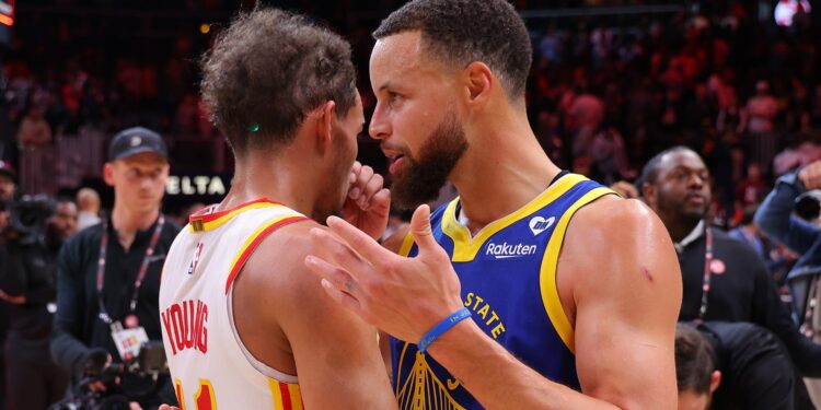 Stephen Curry e Trae Young (Crédito: Getty Images)