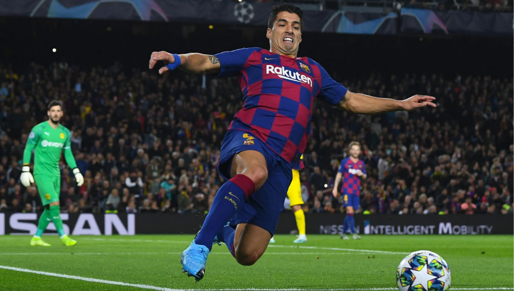 Suárez em ação com a camisa do Barcelona - GettyImages