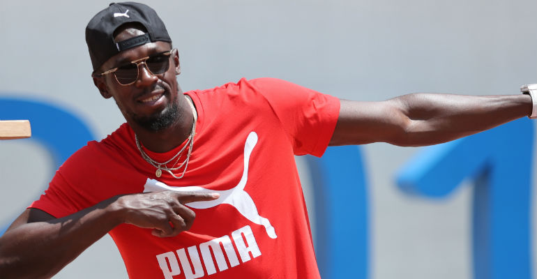 Usain Bolt visita comunidade carente na Jamaica - Getty Images