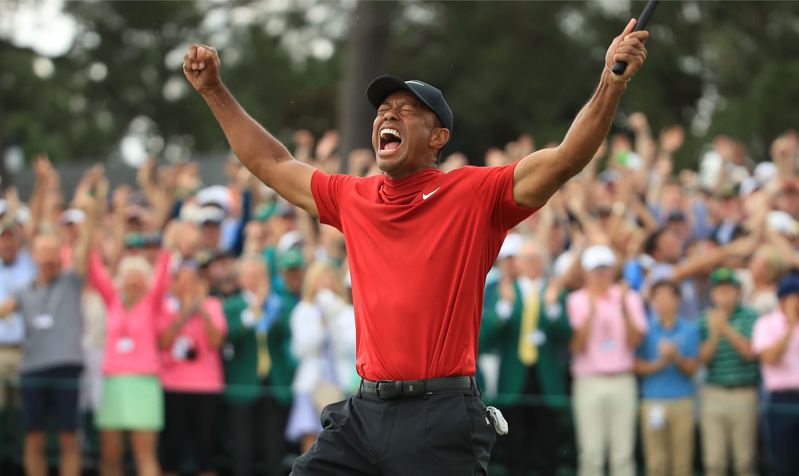 Tiger Woods em comemoração de mais uma vitória - Getty Images