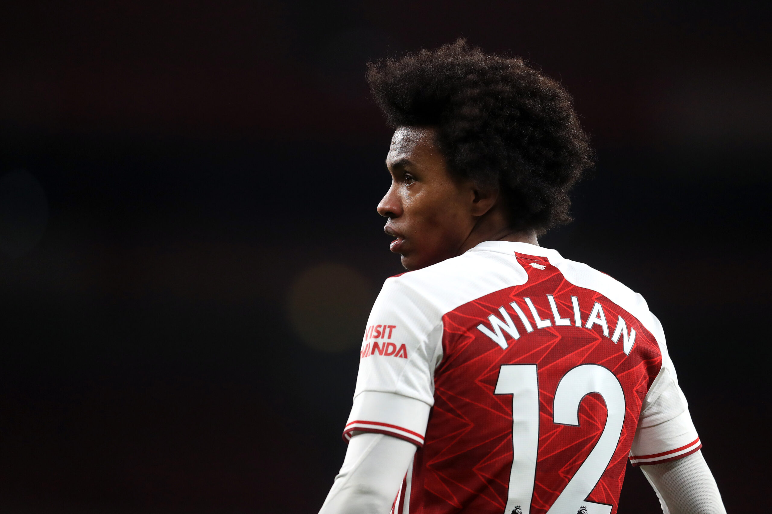 Willian em campo com a camisa do Arsenal - Getty Images