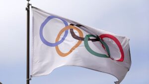 Bandeira com símbolo dos Jogos Olímpicos