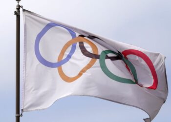 Bandeira com símbolo dos Jogos Olímpicos