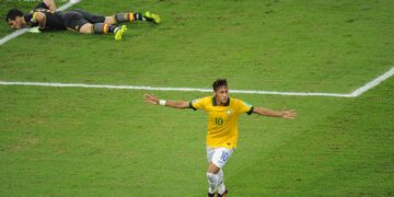 Jogador de futebol Neymar Jr comemorando gol pela seleção brasileira - Créditos: depositphotos.com / A.Paes