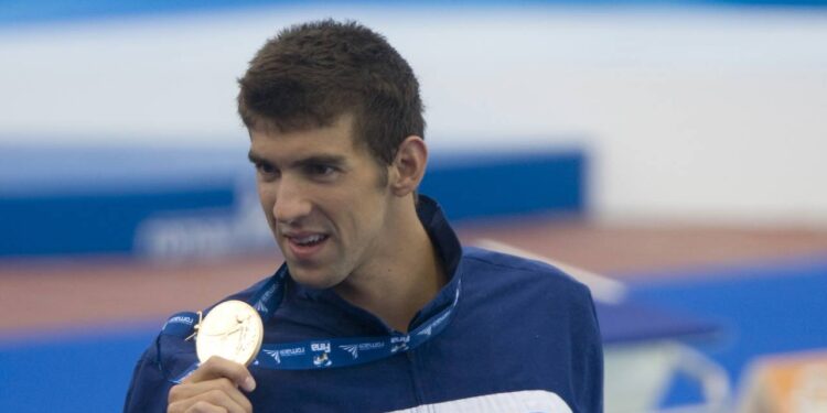 Michael Phelps em ação garantindo medalha - Créditos: depositphotos.com / ESPA