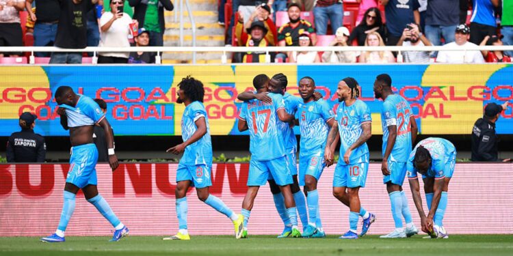 Jogadores de Congo comemorando
