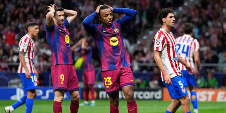 Jogadores do Barcelona lamentando