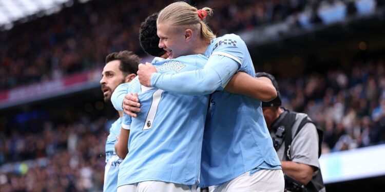Jogadores do Manchester City comemorando