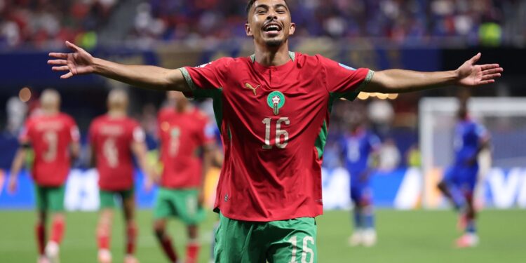 Craque de Marrocos comemorando último gol da partida
