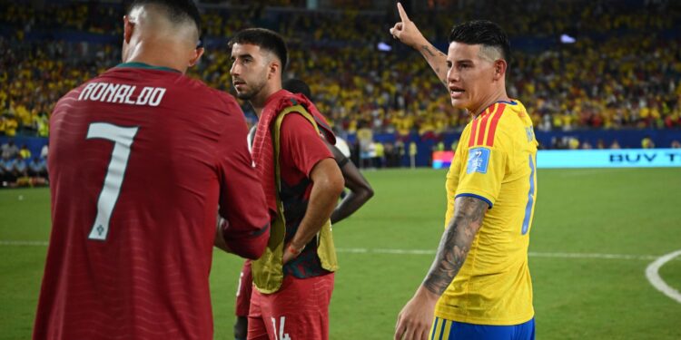 James Rodríguez e Cristiano Ronalo, após Portugal x Colômbia