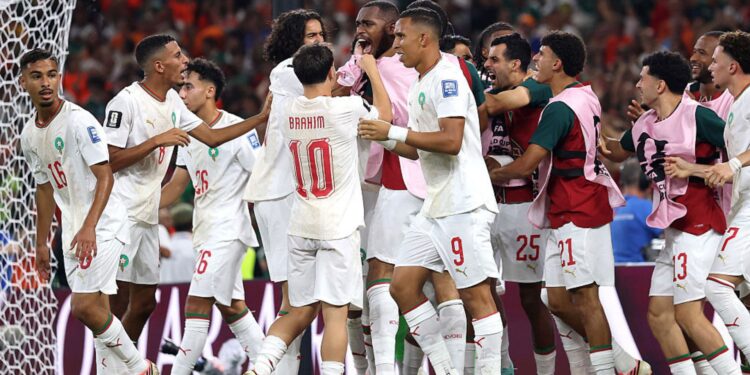 Jogadores de Marrocos comemorando gol de empate