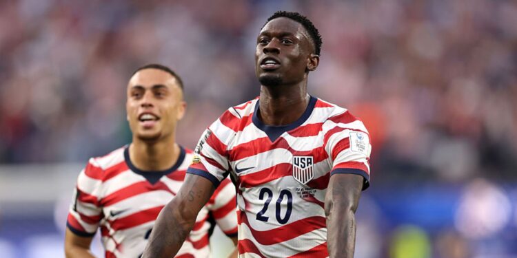 Jogadores dos Estados Unidos comemorando
