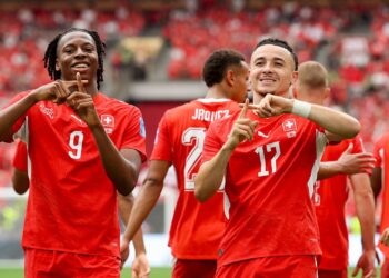 Jogadores da Suíça comemorando