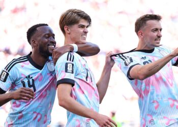 Jogadores da Bélgica comemorando gol contra os EUA