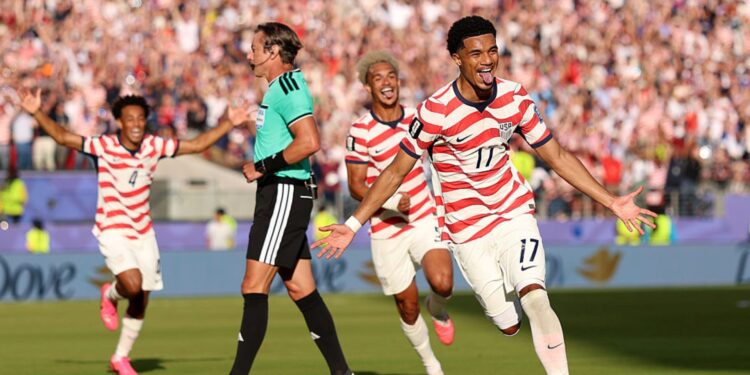 Jogadores dos Estados Unidos comemorando